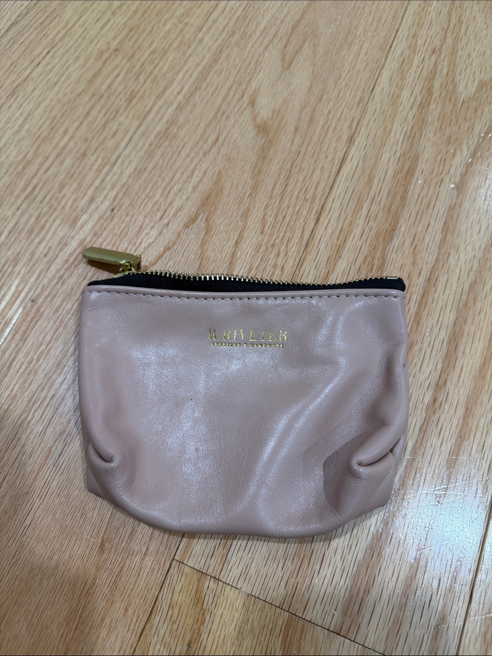 R. Riveter. Leather blush wristlet